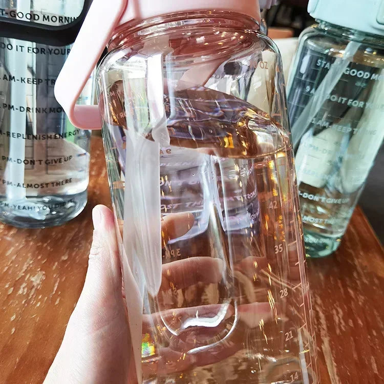 2L sport water bottle with straw and time markers, BPA-free, blue