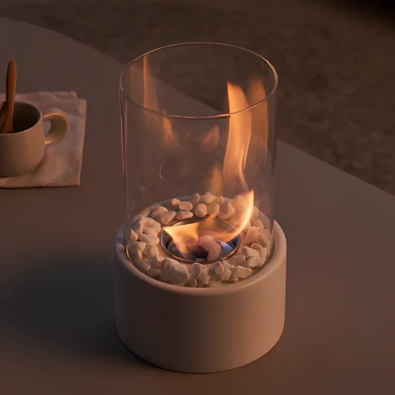 Decorative ethanol oil lamp with metal frame, glass cylinder, and decorative stones, indoor and outdoor