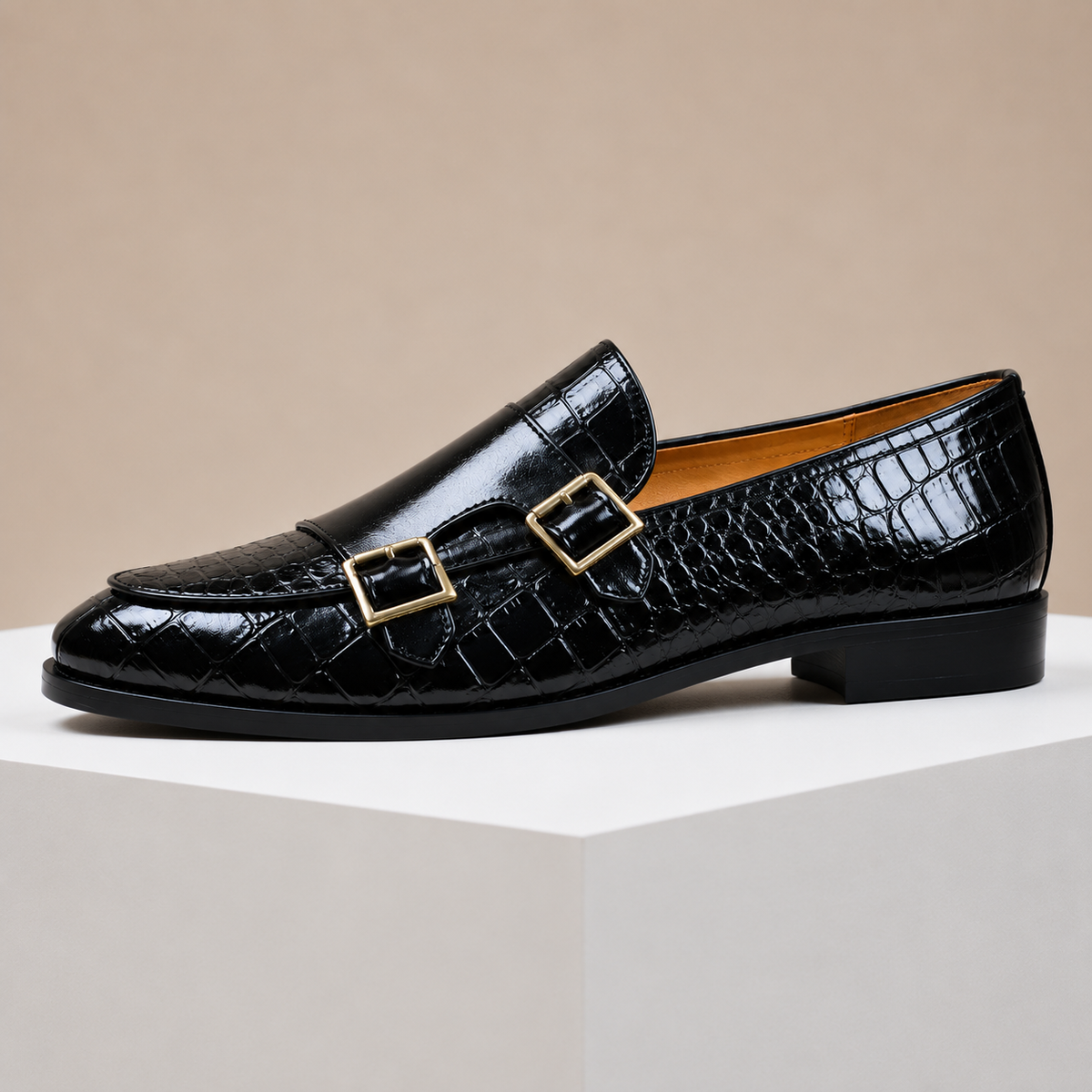 Men's leather loafers with double monk strap buckles and almond toe, crocodile-embossed finish