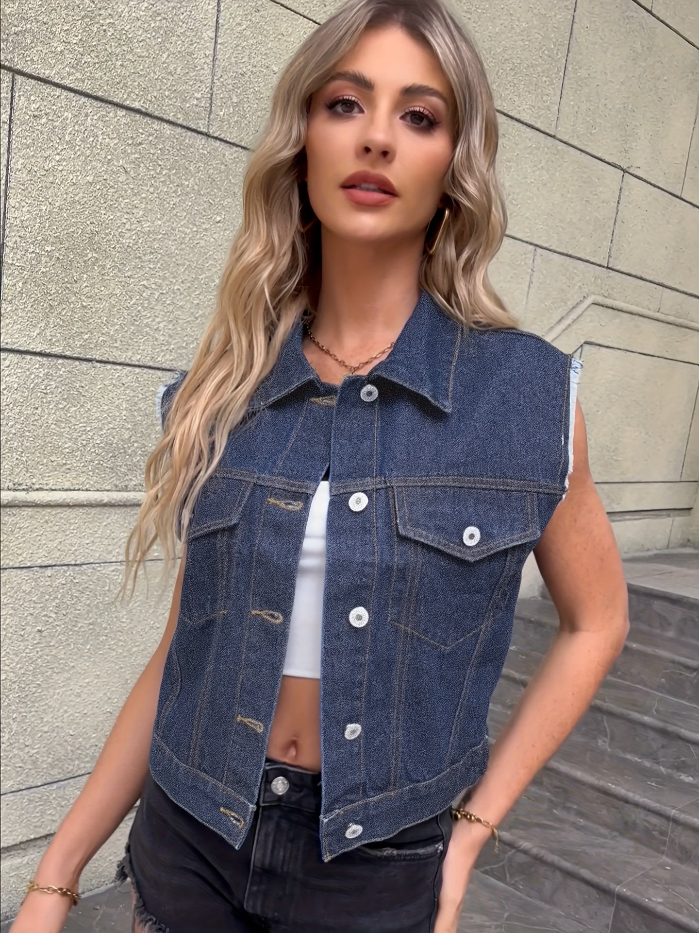 Women denim sleeveless jacket with flap pockets regular fit