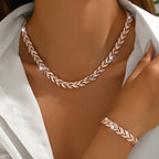Women fishtail necklace with glass rhinestones in rose gold and silver