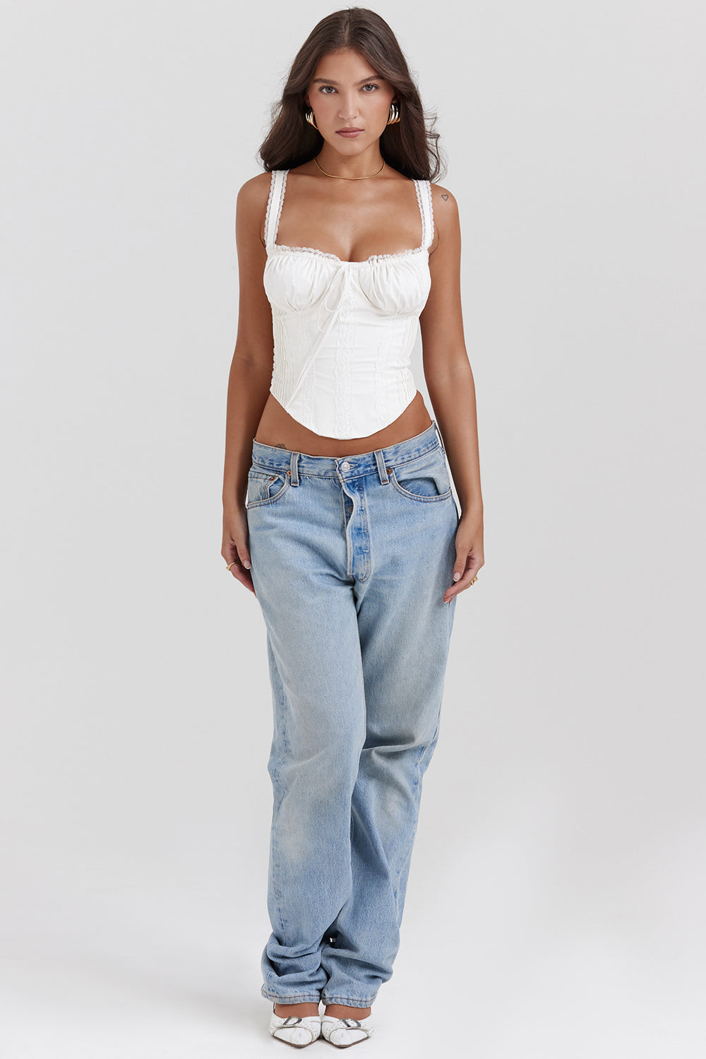 Women white lace-up corset top with delicate lace straps and ruched bust