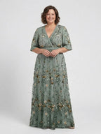 Green floral maxi dress with V neckline and elbow-length sheer sleeves