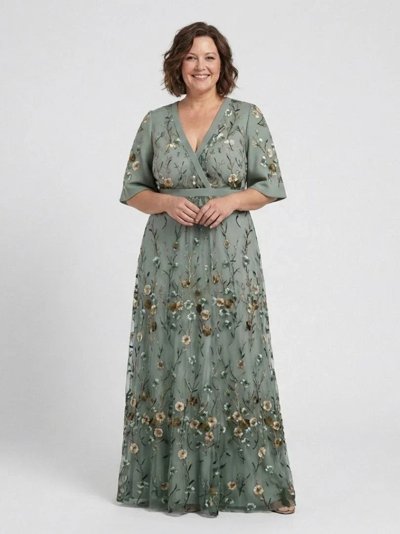 Green floral maxi dress with V neckline and elbow-length sheer sleeves