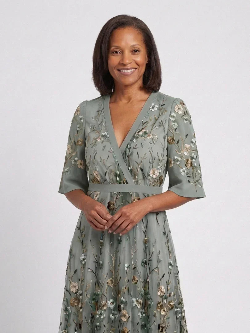 Green floral maxi dress with V neckline and elbow-length sheer sleeves