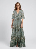 Green floral maxi dress with V neckline and elbow-length sheer sleeves