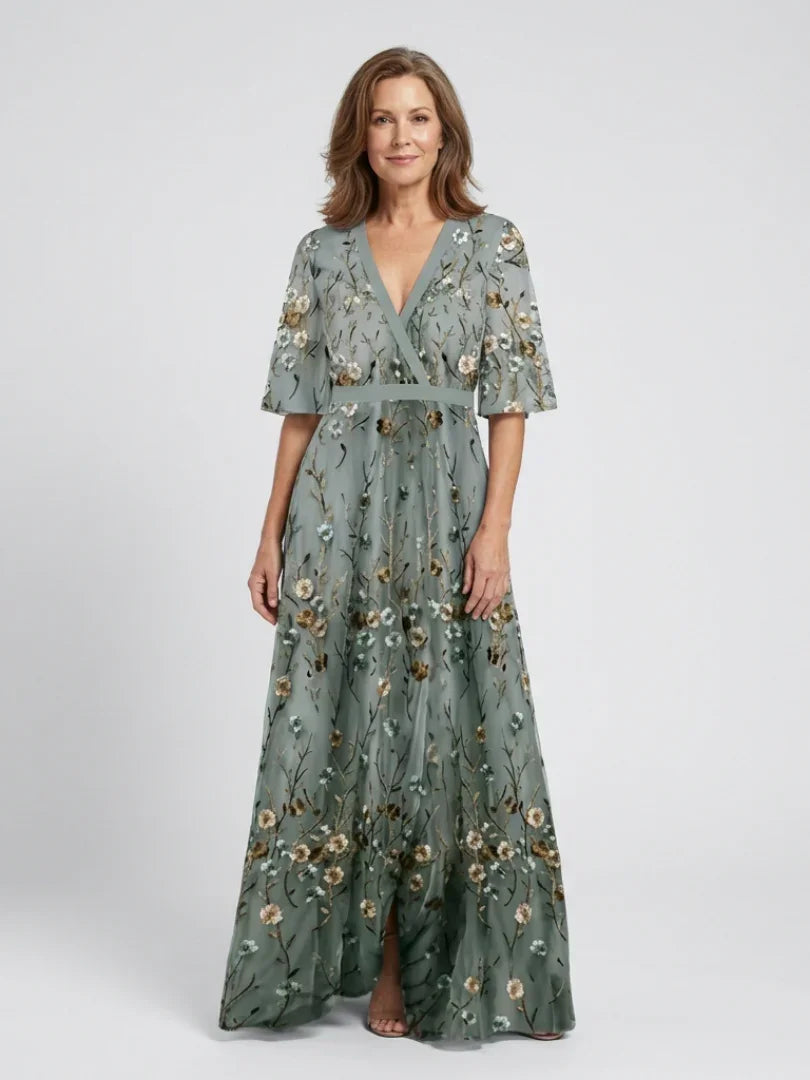Green floral maxi dress with V neckline and elbow-length sheer sleeves