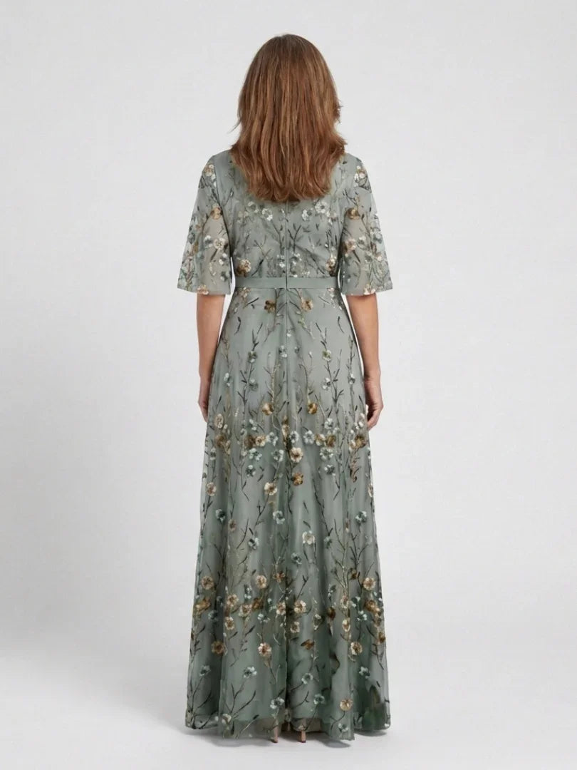 Green floral maxi dress with V neckline and elbow-length sheer sleeves