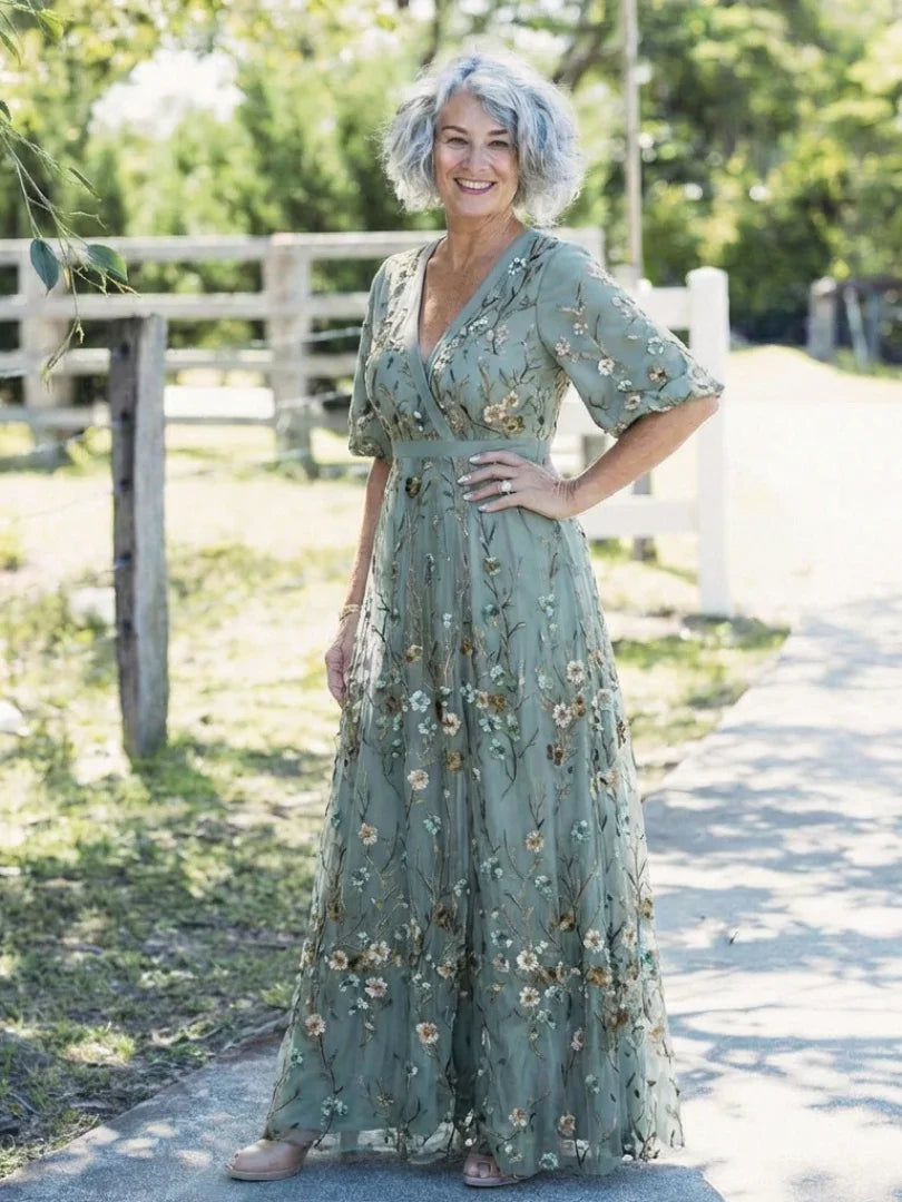 Green floral maxi dress with V neckline and elbow-length sheer sleeves