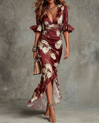 Women's floral satin midi dress with deep V-neckline and ruched waist