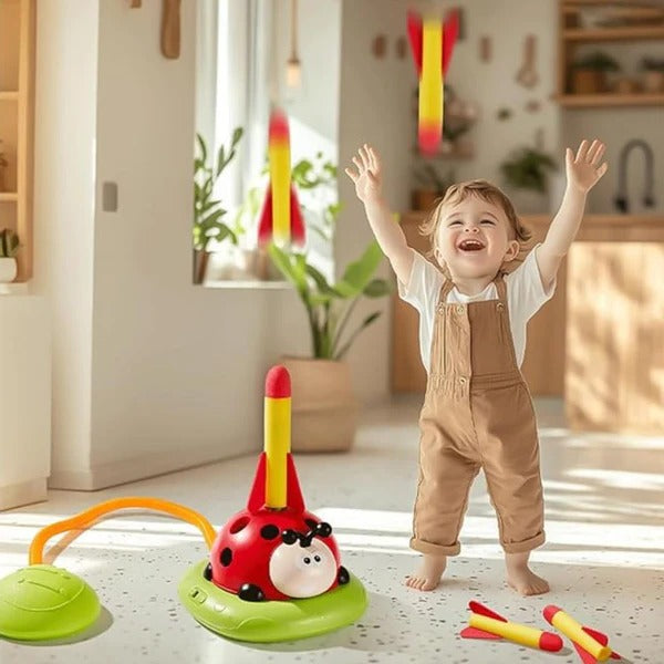3-in-1 kids activity toy with jumping pad, ring toss and rocket launcher for ages 2+