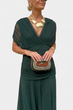Women's floral midi dress with V-neckline and pleated waist, elegant long flowing skirt