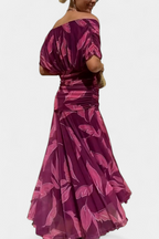 Women's floral midi dress with V-neckline and pleated waist, elegant long flowing skirt