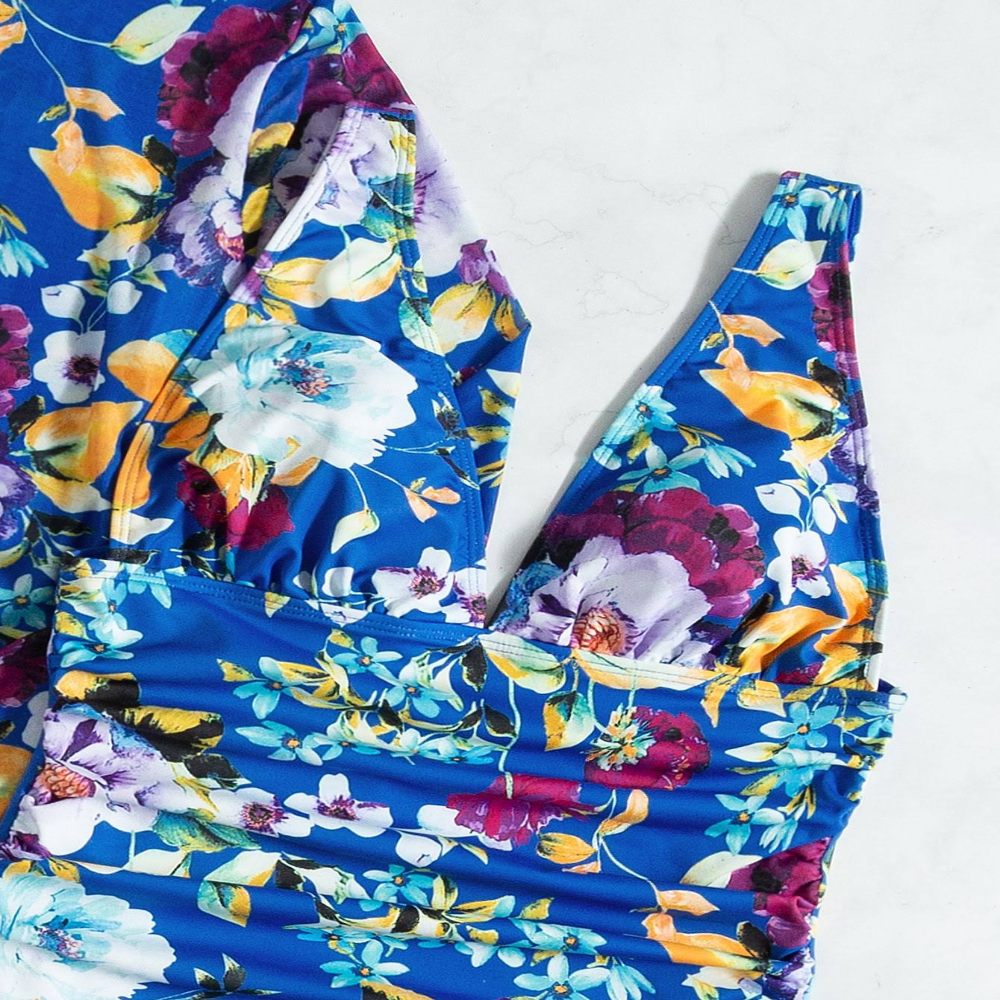 Women's 3-piece blue floral bikini set with wrap skirt, sizes S-XL