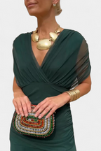 Women's floral midi dress with V-neckline and pleated waist, elegant long flowing skirt