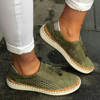 Women slip-on casual sneakers perforated upper with cork trim and tassel accents
