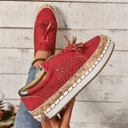 Women slip-on casual sneakers perforated upper with cork trim and tassel accents