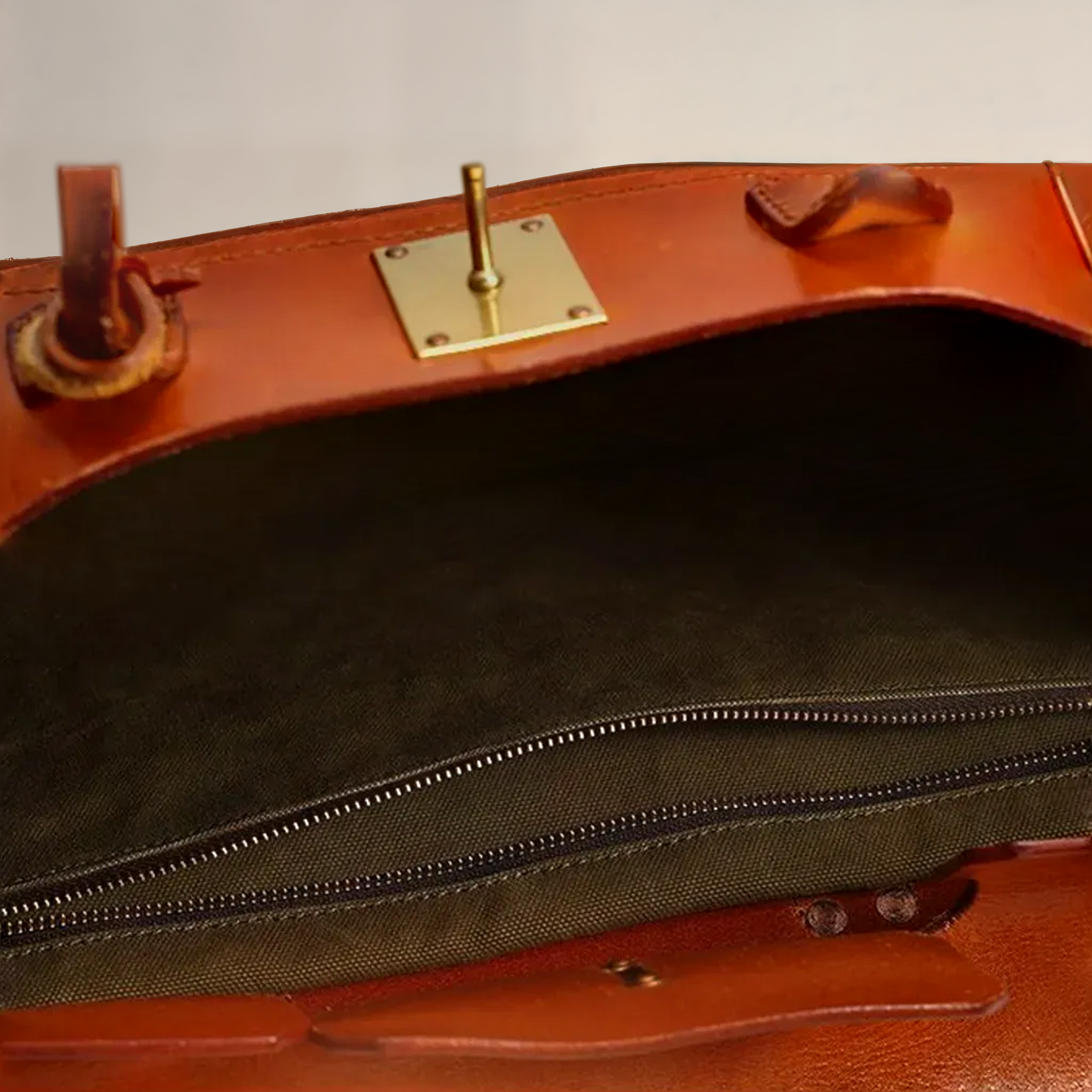 Leather weekend bag in light chocolate, top grain leather with gold tone hardware