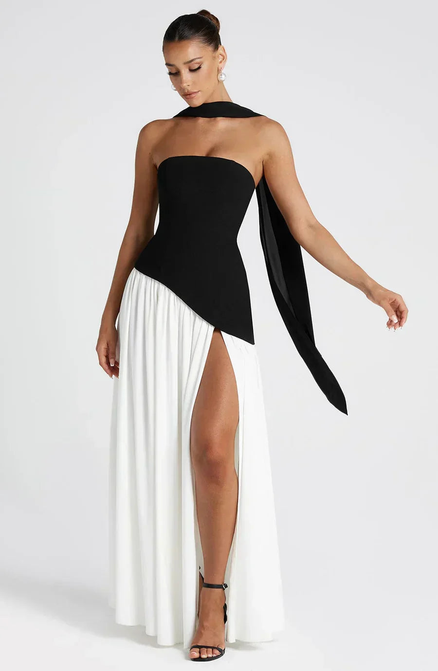 Women's strapless maxi dress with thigh slit and flowy skirt, formal evening style