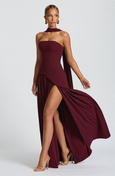 Women's strapless maxi dress with thigh slit and flowy skirt, formal evening style