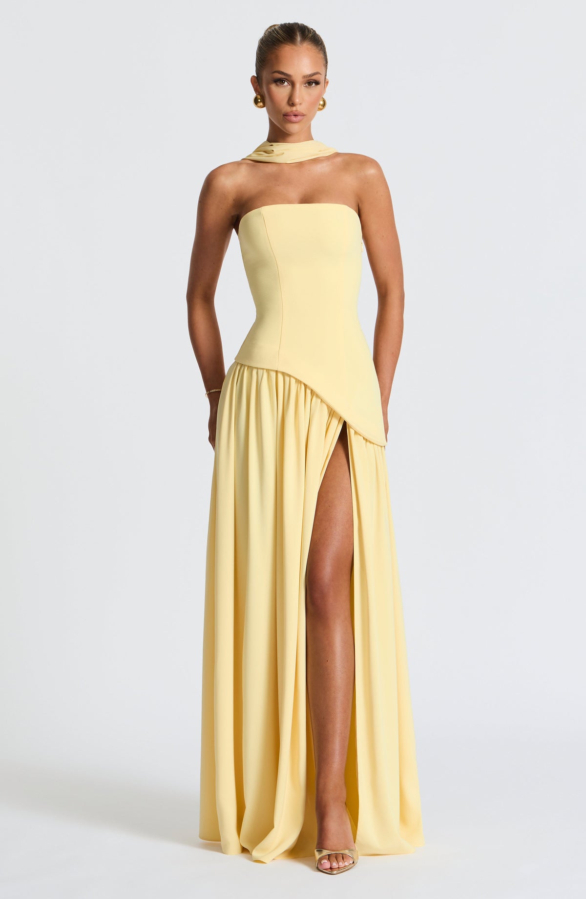 Women's strapless maxi dress with thigh slit and flowy skirt, formal evening style