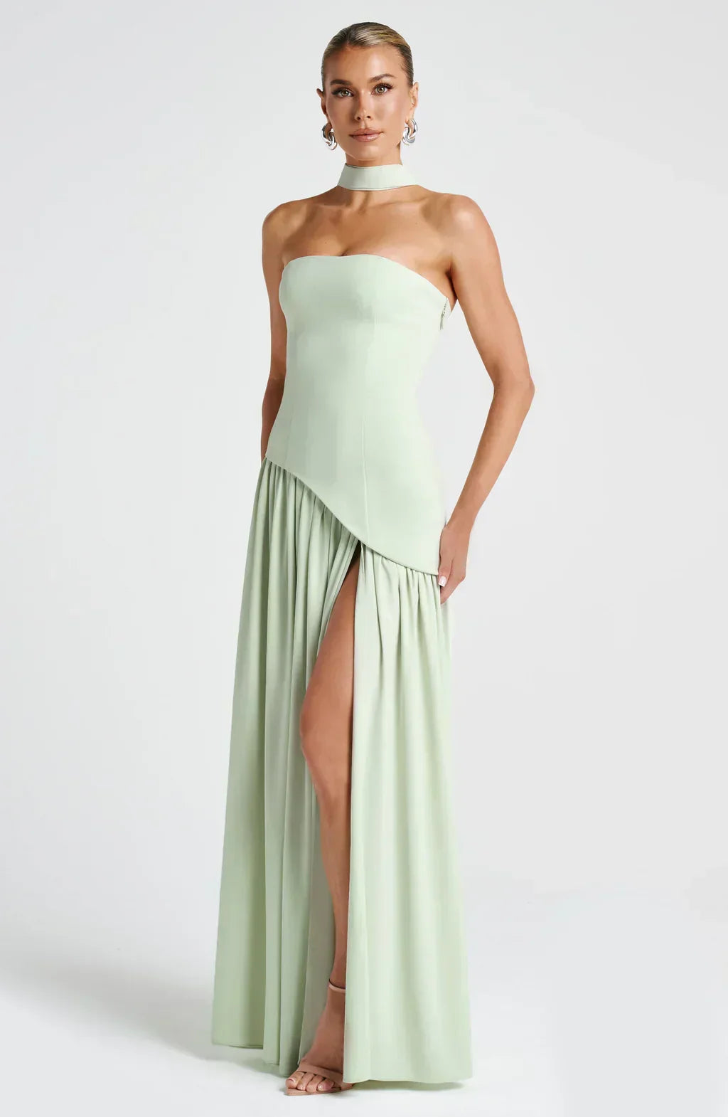 Women's strapless maxi dress with thigh slit and flowy skirt, formal evening style