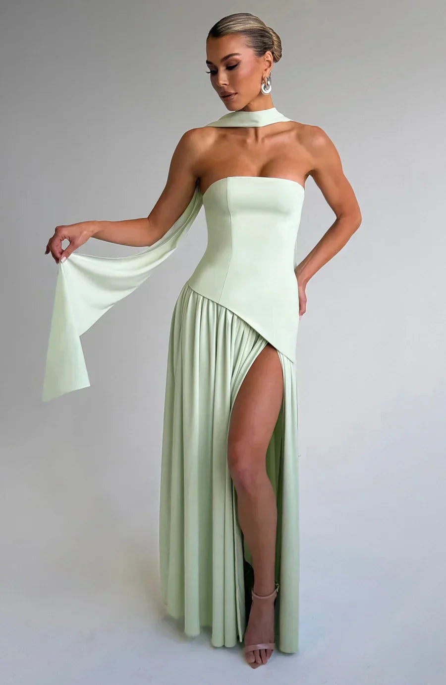 Women's strapless maxi dress with leg slit and flowy skirt, formal evening wear
