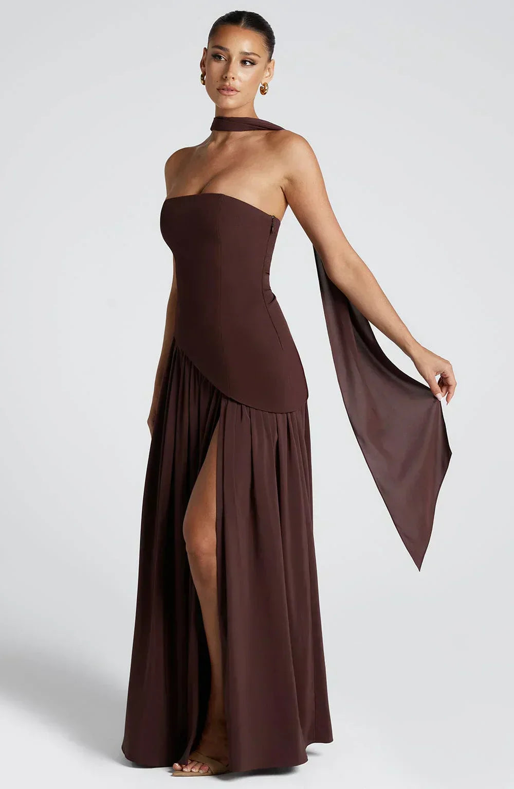 Women's strapless maxi dress with thigh slit and flowy skirt, formal evening style