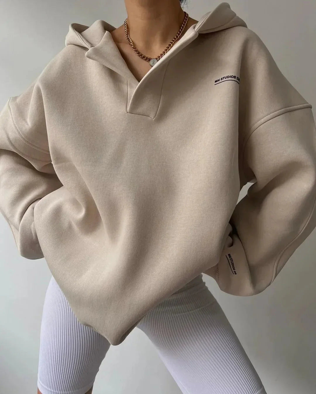Women oversized pullover hoodie with notch neck and drop shoulder design