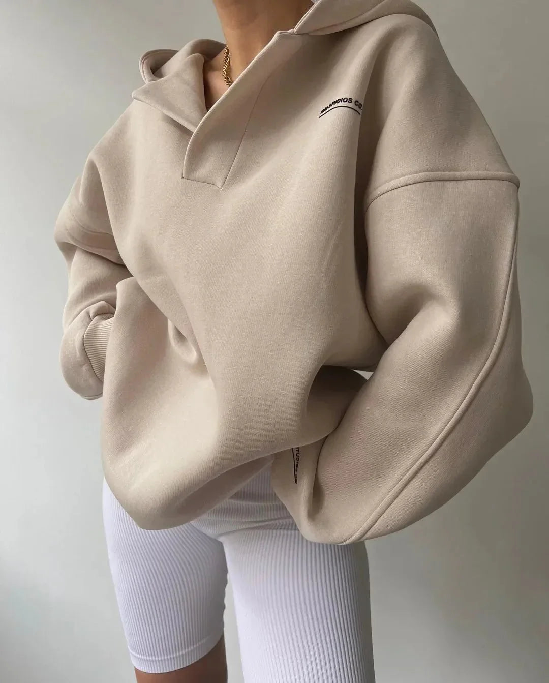 Women oversized pullover hoodie with notch neck and drop shoulder design