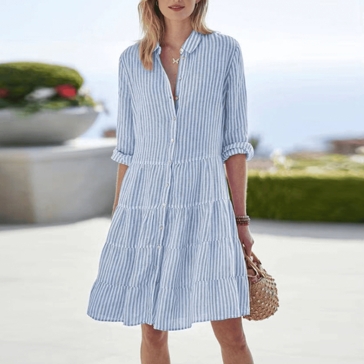 Women's striped button-front midi dress with tiered silhouette, casual summer style