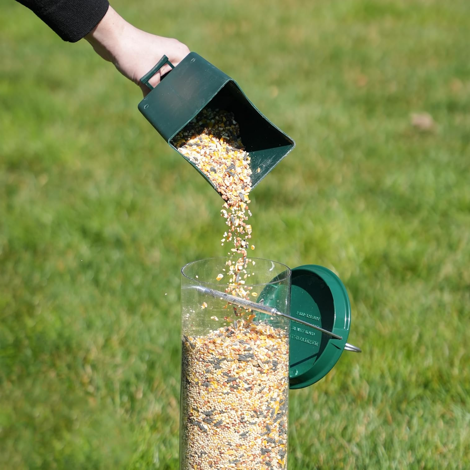 Squirrel proof bird feeder with rotating perch, 4 feeding ports and heavy-duty metal construction