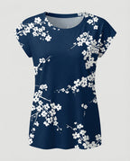 Women's summer blouse with watercolor floral print, asymmetric hem and relaxed loose fit