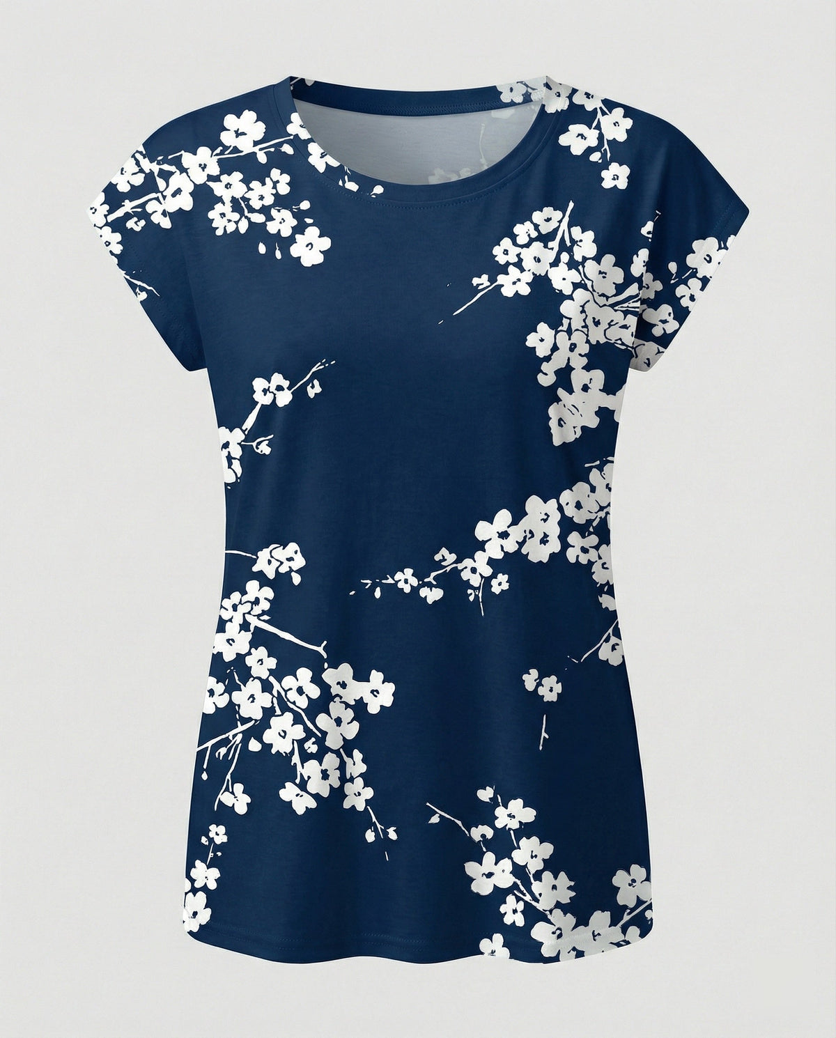 Women's summer blouse with watercolor floral print, asymmetric hem and relaxed loose fit