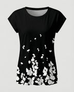 Women's summer blouse with watercolor floral print, asymmetric hem and relaxed loose fit