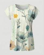 Women's summer blouse with watercolor floral print, asymmetric hem and relaxed loose fit