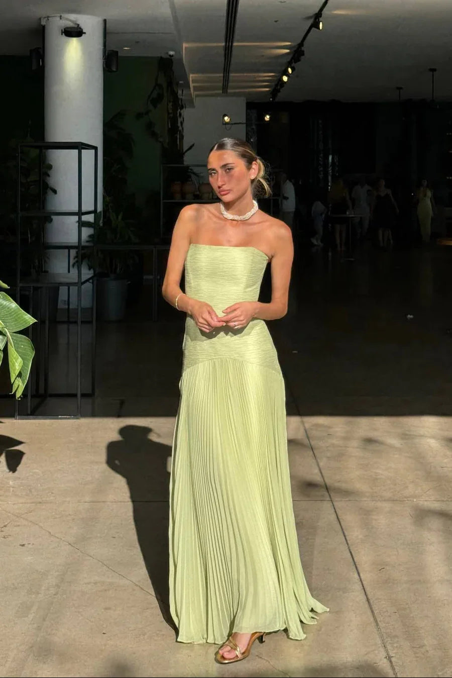 Women's strapless pleated maxi dress in green, formal evening wear