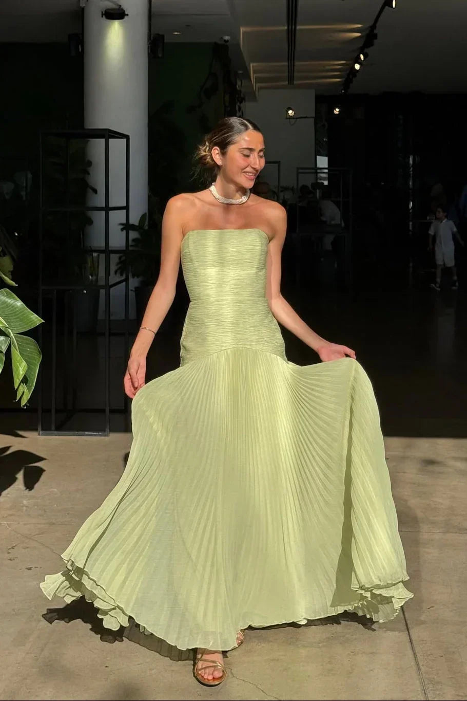 Women's strapless pleated maxi dress in green, formal evening wear