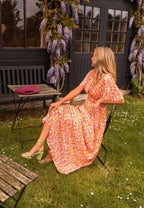 Women's floral maxi dress with short flutter sleeves and V-neckline, summer style