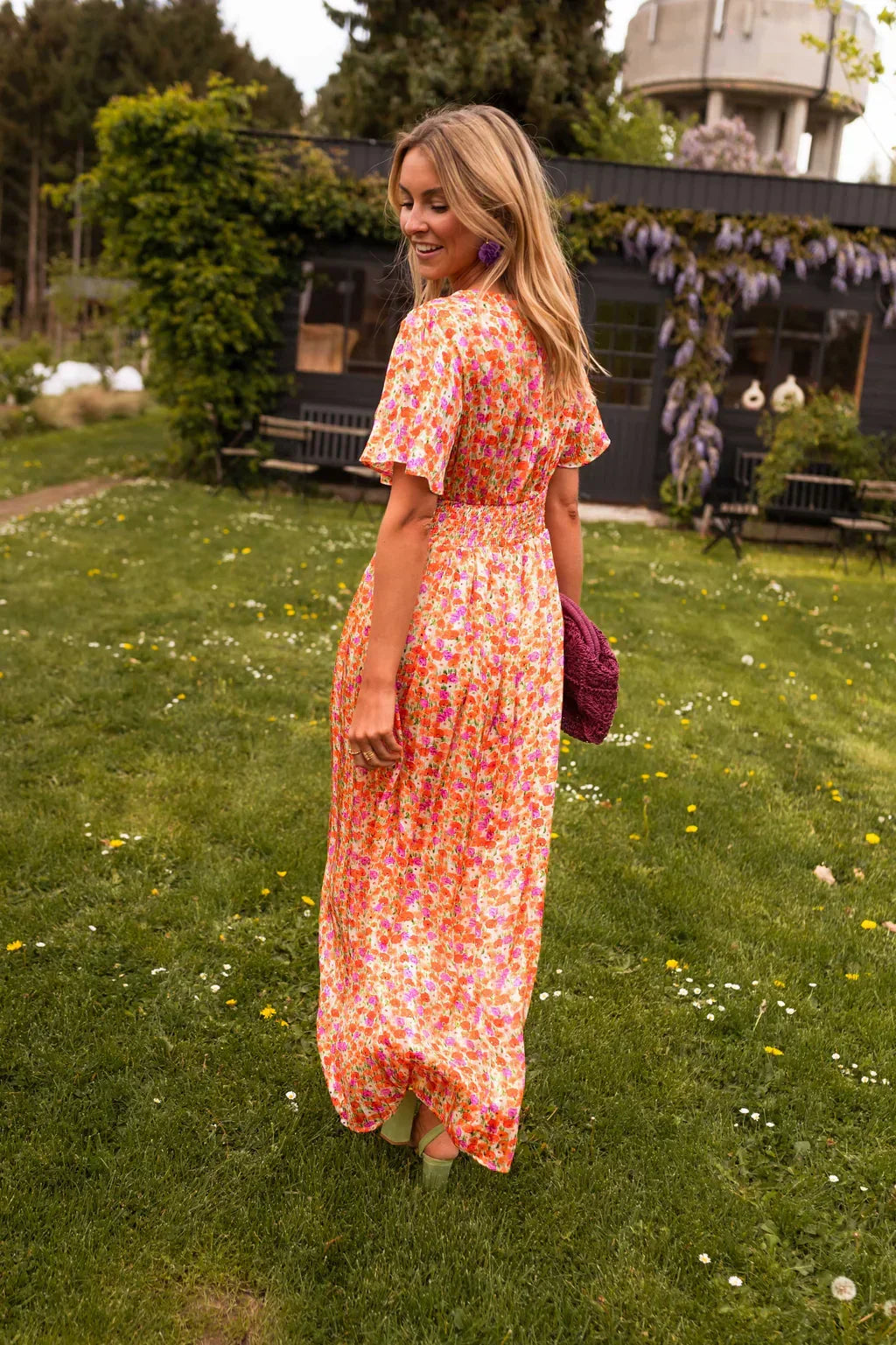 Women's floral maxi dress with short flutter sleeves and V-neckline, summer style