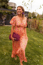 Women's floral maxi dress with short flutter sleeves and V-neckline, summer style