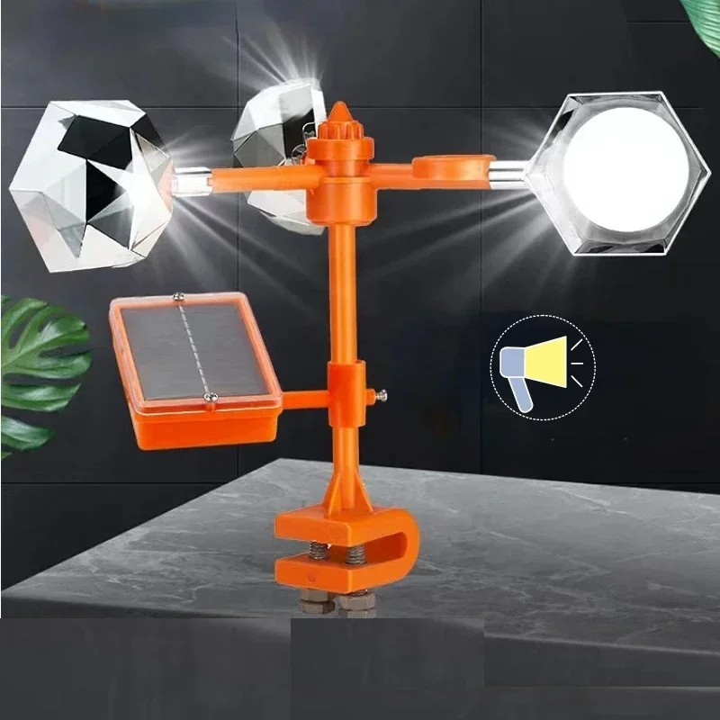 Solar powered 360 rotating bird repeller with reflective panels and ultrasonic sound