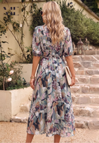 Floral midi dress with puff sleeves and flattering waist-tailored fit