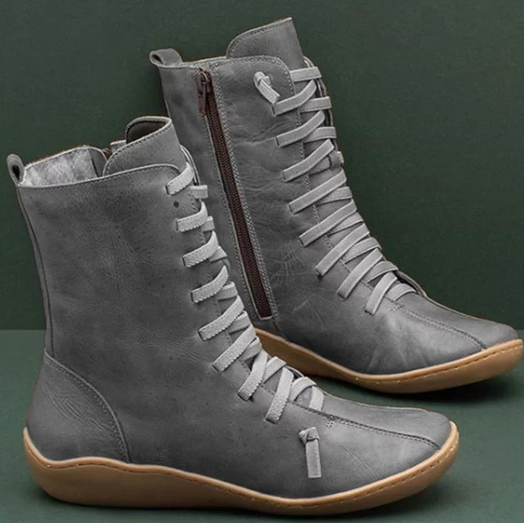 Women's handcrafted ankle boots with non-slip sole, available in multiple colours
