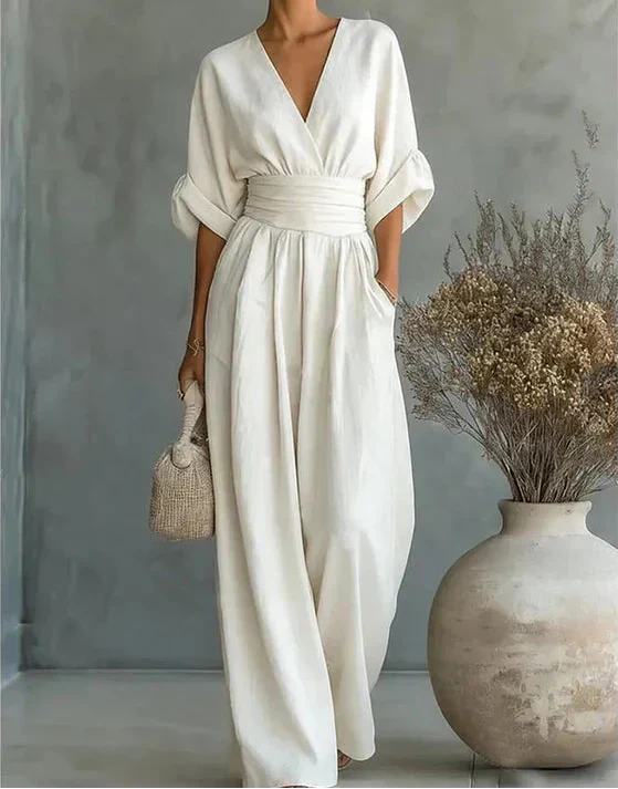 Women's wide-leg jumpsuit with V-neck and belted waist, elegant occasion wear