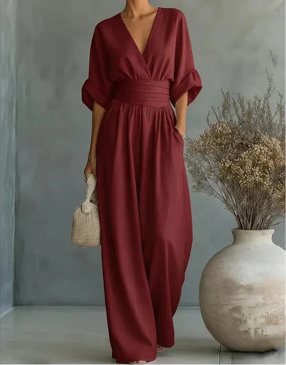 Women's wide-leg jumpsuit with V-neck and belted waist, elegant occasion wear