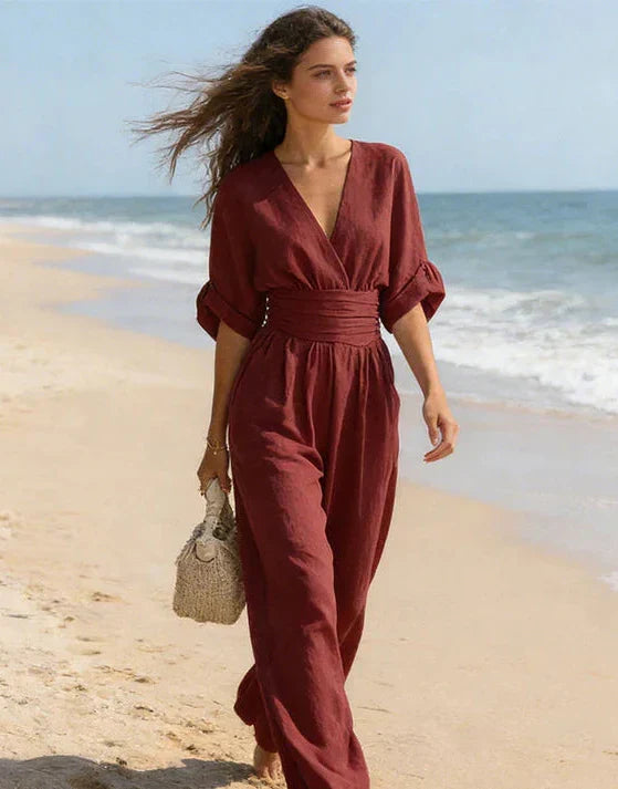 Women's wide-leg jumpsuit with V-neck and belted waist, elegant occasion wear