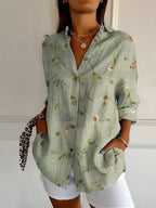 Women abstract print split neck blouse long sleeve button front in multiple colors