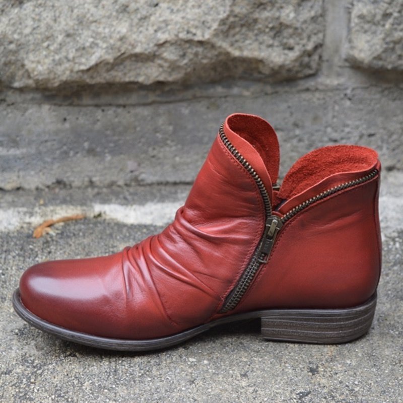 Women ankle boots with zip closure and low heel in multiple colours