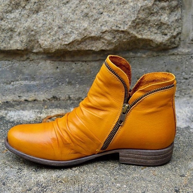 Women ankle boots with zip closure and low heel in multiple colours